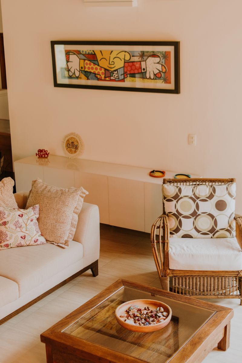 A warm, modern living room with a terracotta sofa